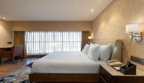 Superior Twin Room - Enjoy tea/coffee, 1 veg snack, 1 dessert for Rs 199+ taxes