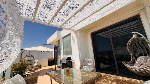 Three-Bedroom Apartment with Sea View