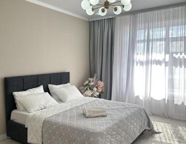 Three-Bedroom Premium Apartment with Balcony