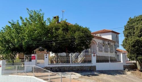 Six-Bedroom House