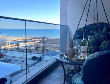 One-Bedroom Apartment with Balcony and Sea View