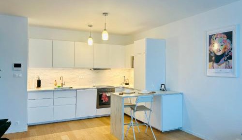 One-Bedroom Apartment with Balcony and City View