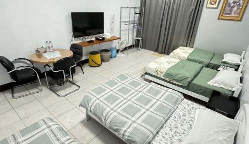 Quadruple Room with Shared Bathroom