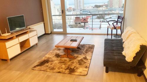 One-Bedroom Apartment with Balcony and City View