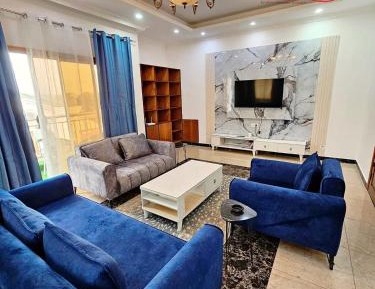 Four-Bedroom Apartment with Balcony 