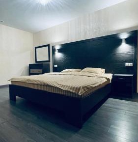 Four-Bedroom Apartment with Balcony 