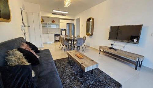 One-Bedroom Apartment with Balcony and City View