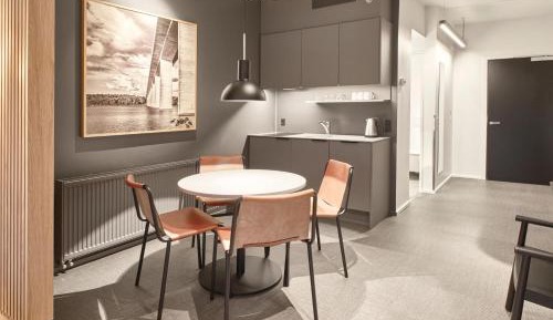 Larger Family Studio with One King and Non-Private Sofa Bed