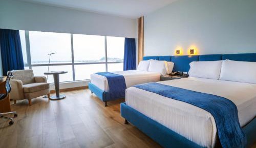 Room with Two Double Beds and River View