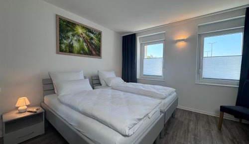 Four-Bedroom Apartment with Balcony 