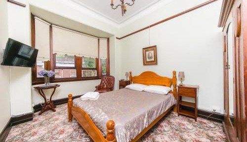 Queen Room with Shared Bathroom