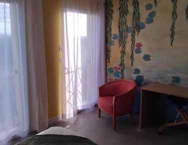 Quadruple Room with Private Bathroom