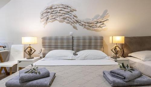 Deluxe Quadruple Room with Jetted Shower