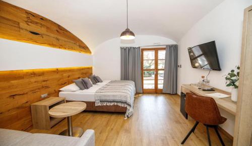 Superior Double Room with Sofa and with Garden View