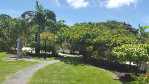 Double Room with Two Double Beds and Garden View