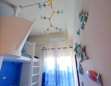 Quadruple Room with Private Bathroom