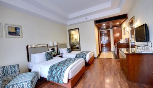 "Deluxe Twin with 15% off on session of Spa , 15% off on F&B Services   ( soft beverages only and excluding IRD ) , 15% off on laundry services and Enjoy Happy Hours 1+1 Offer from 6 PM-8 PM."