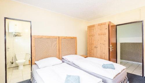 Quadruple Room with Private Bathroom