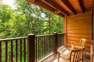 King Room with Jetted Tub and Forest View with Balcony - Non-Smoking
