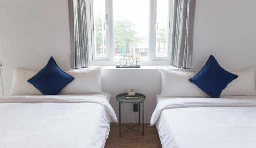 Quadruple Room with City View and Balcony