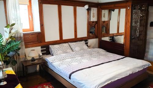 Queen Room with Shared Bathroom