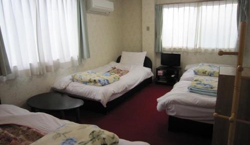 Quadruple Room with Shared Bathroom