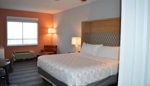 Queen Room with Two Queen Beds and Sofa Bed