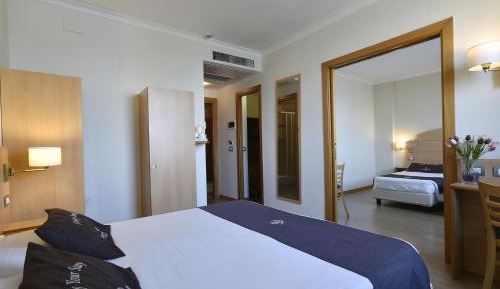 Quadruple Room with 4 Single Beds