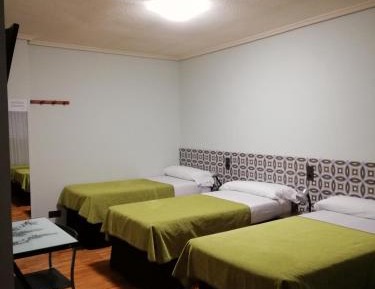 Quadruple Room with Shared Bathroom