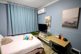 Enshi Apartment | 『花漾拾光』烟雾蓝ins风/50寸智能高清电视随心投屏/自主入住/近九立方女儿城/舞阳坝商圈