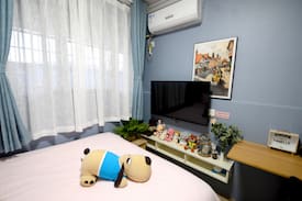 Enshi Apartment | 『花漾拾光』烟雾蓝ins风/50寸智能高清电视随心投屏/自主入住/近九立方女儿城/舞阳坝商圈