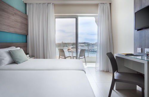 Gzira Hotel | 115 the Strand Hotel & Suites by Neu Collective