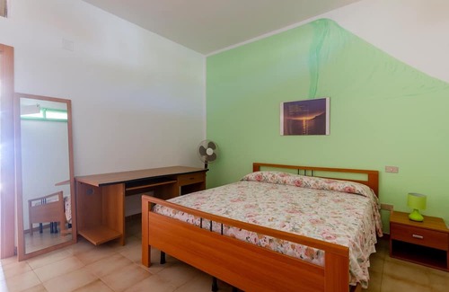 Mattinata Apartment | Enjoy a magnificent view of the sea from this vacation apartment.