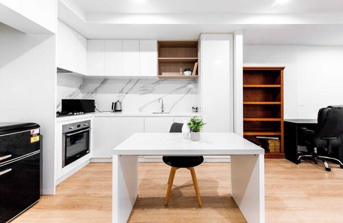 Essendon Apartment | Workers Retreat Across from Essendon Station