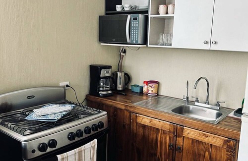 Villa Nueva Apartment | Charming 3-bedroom apartment with AC and WiFi in enchanting Amatitlán