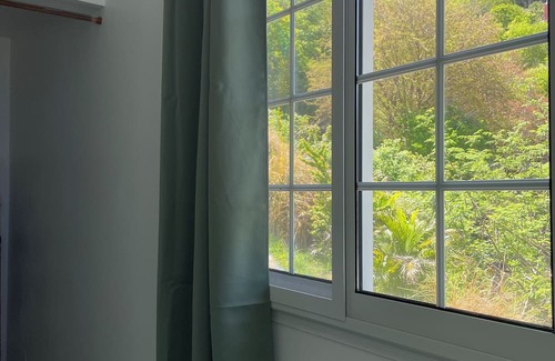 Les Anses-d'Arlets Apartment | "Sweet bamboo" bottom of villa, sea view, 2 minutes from the beach