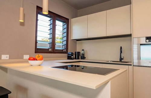 Fryes Beach Apartment | Luxury Cottage with ocean views, large 1-bedroom, AC and close to Jolly Harbour
