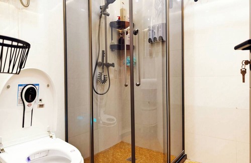 Da Dong Apartment | Beautiful penthouse apartment in Shenyang with full amenities, kitchen, WiFi, AC