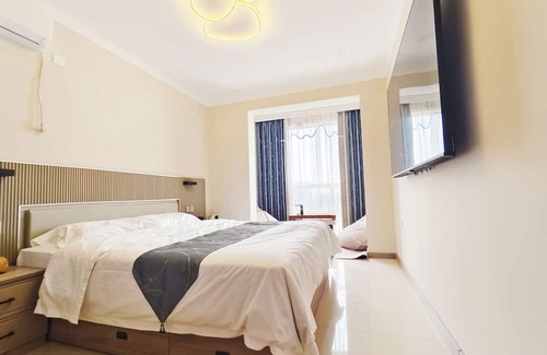 Da Dong Apartment | Beautiful penthouse apartment in Shenyang with full amenities, kitchen, WiFi, AC