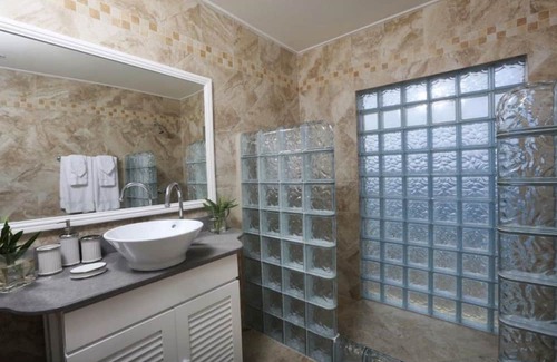 Sea Breeze Hills Villa | Luxurious 4 Br Oceanfront Villa