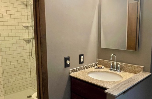 Elkhart Lake Condo | Fronting lively Lake Street in lovely Elkhart Lake, the Kick Back is your place!