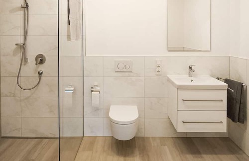 Mehring Apartment | This modern vacation apartment not far from the Moselle welcomes you with a wonderful view of the co