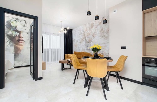 Rzeszow Apartment | Al. Kopisto 11 Rzeszów | Black and Yellow Apartment with Air Conditioned Living