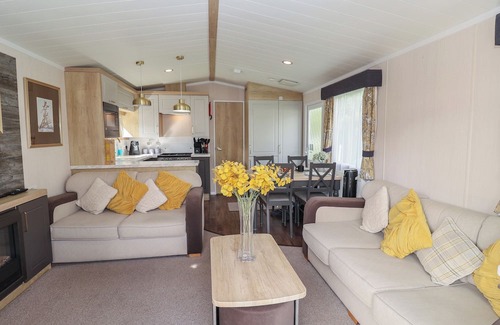 Hopton Cottage | STAG LODGE, CARAVAN 70, with pool in Belton, Norfolk