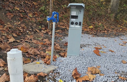 Fowler RV Rental | Campground in Masury 50 Amp full hook up sewer and water for winter camping