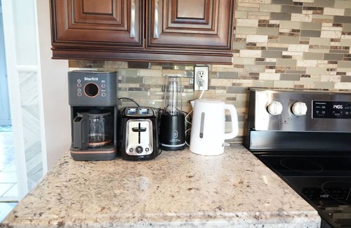 Brampton West House | Poolside Retreat with Private Patio