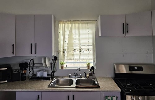 St. John's Apartment | Beautiful modern retreat with stunning views of mountain ranges & Seaview