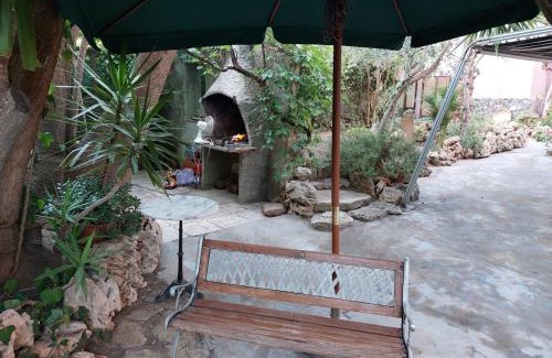 Torre del Pozzo Apartment | Relax in giardino