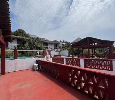 Santa Maria House | Seaside Serenity: Iconic Surf Bungalows