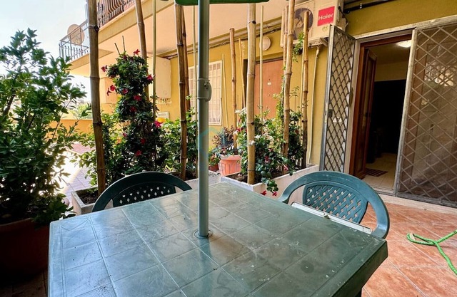 82 - Angiulli - Cozy Garden Escape